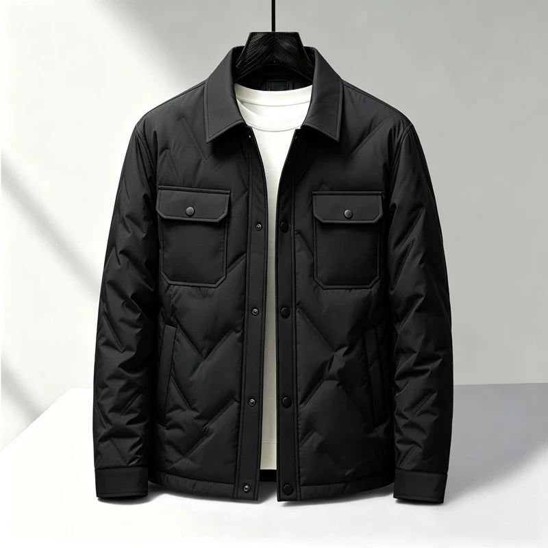 Black quilted puffer jacket with snap button front, front view