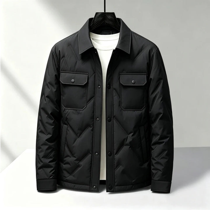 Black quilted puffer jacket with snap button front, front view