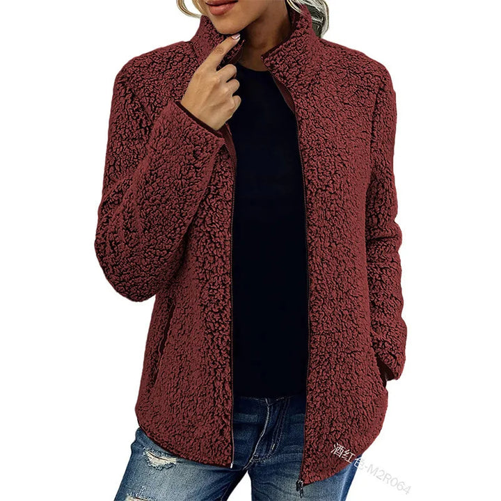 Woman wearing wine red sherpa fleece zip jacket