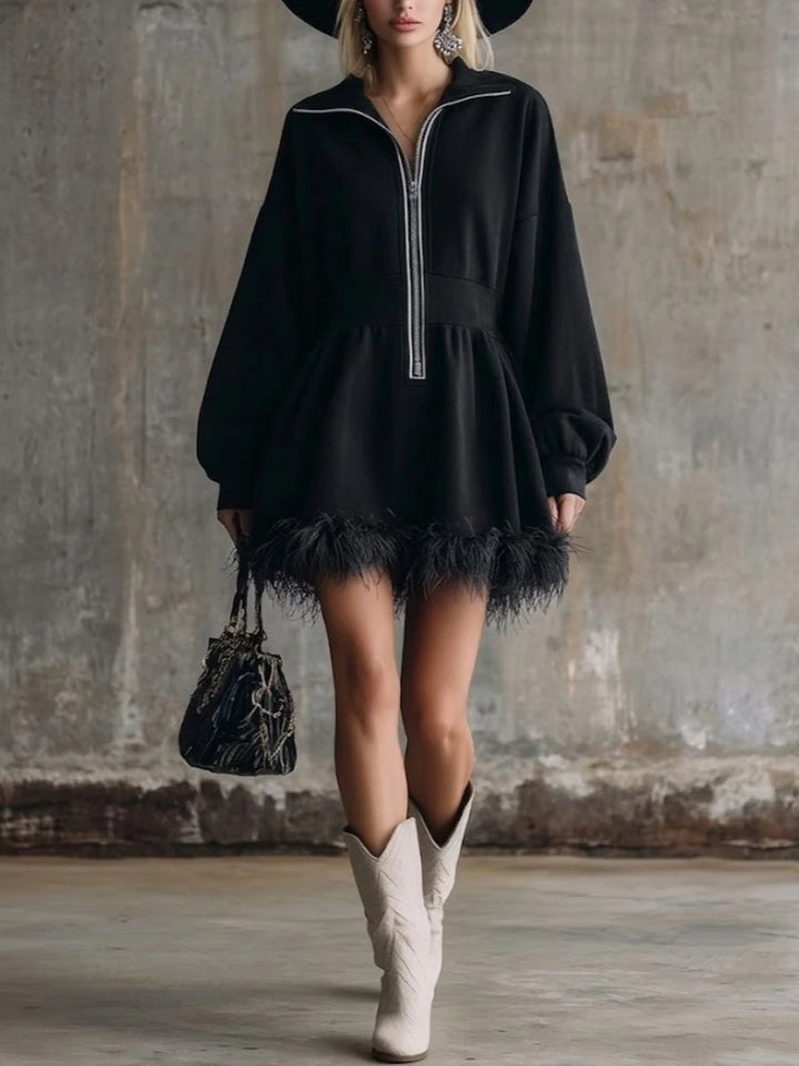 Black half-zip sweatshirt mini dress with feather trim hem, front view