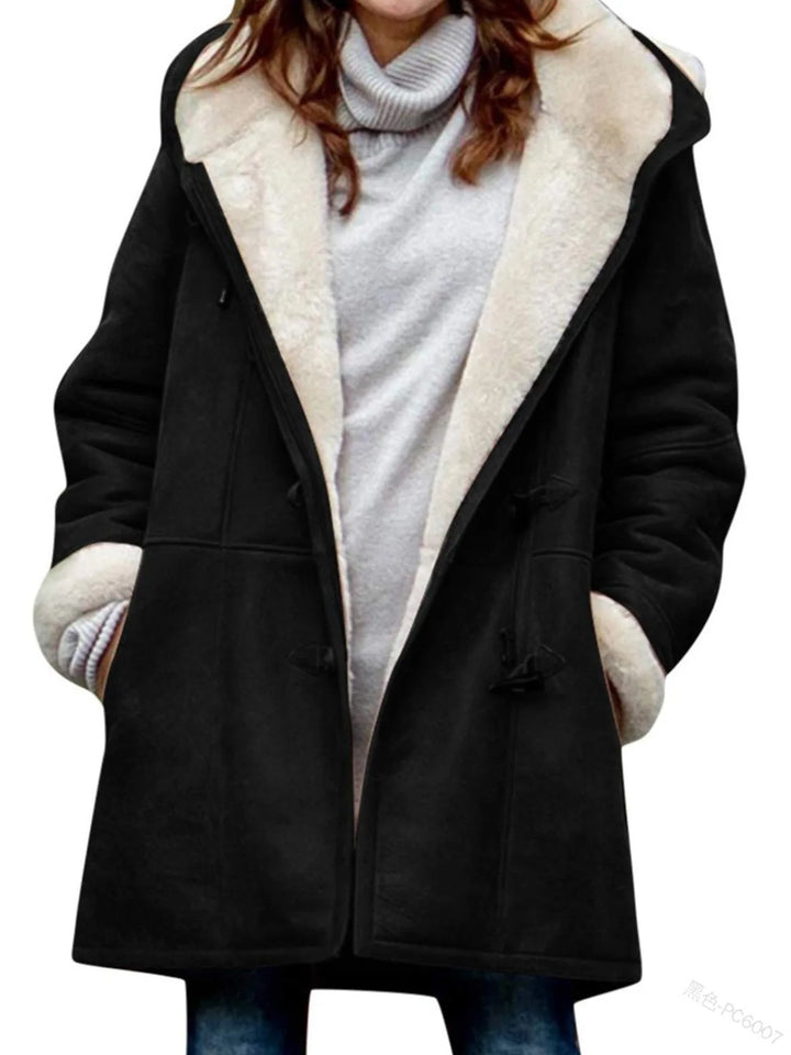 Black duffle coat close front view with shearling collar