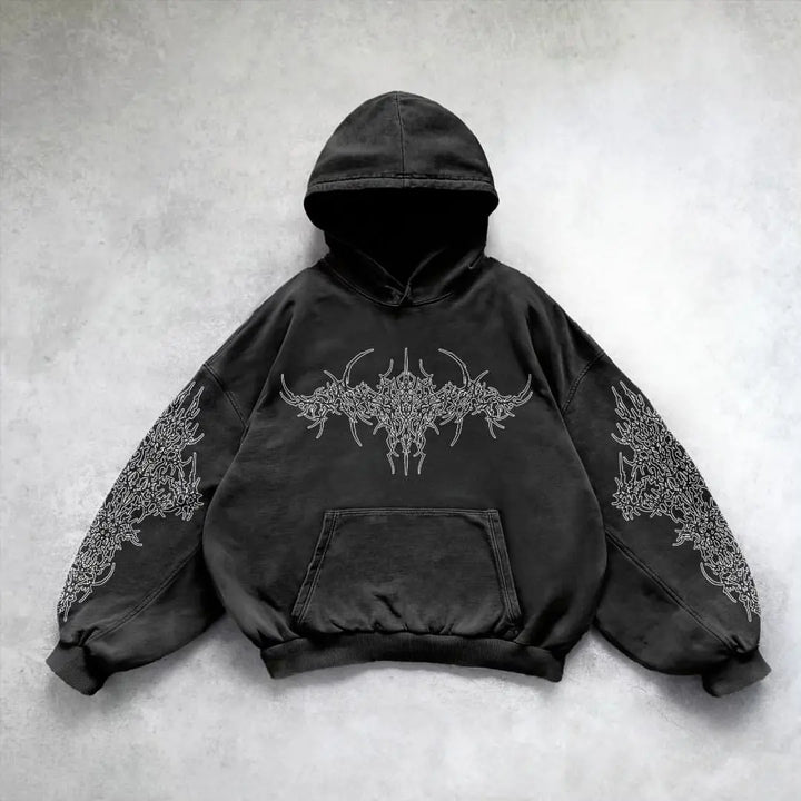 Front view of black oversized hoodie with gothic chest graphic