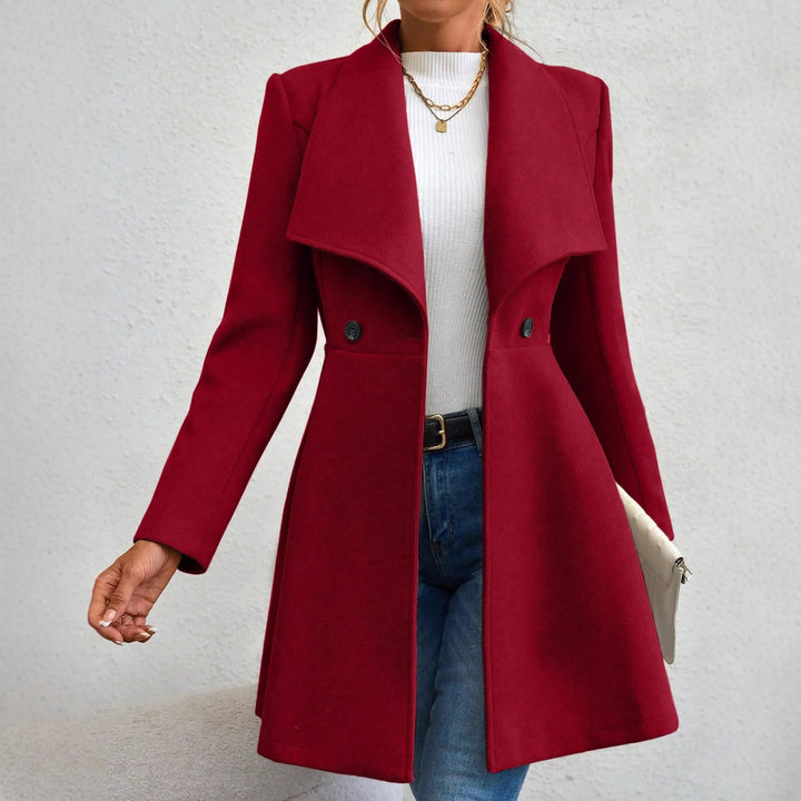 Woman wearing red waterfall collar swing coat, front view