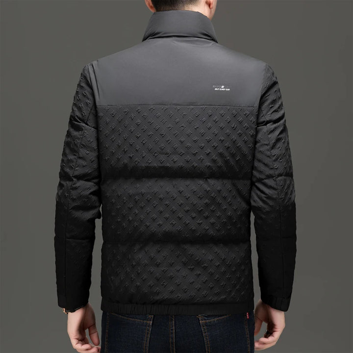 Back view of black quilted puffer jacket with stand-up collar