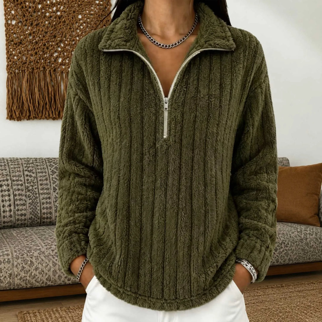 Woman wearing army green ribbed quarter-zip pullover