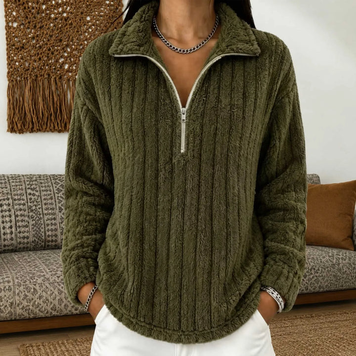 Woman wearing army green ribbed quarter-zip pullover