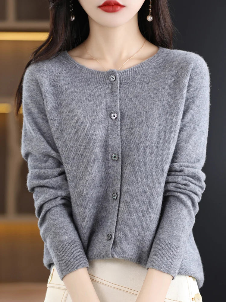 Woman wearing gray button front knit cardigan