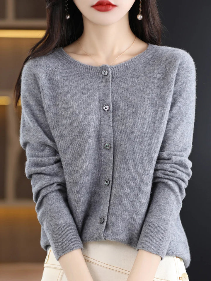 Woman wearing gray button front knit cardigan