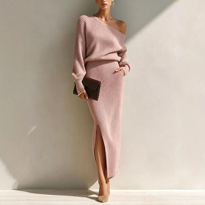 Woman wearing pink off shoulder ribbed knit sweater and skirt set