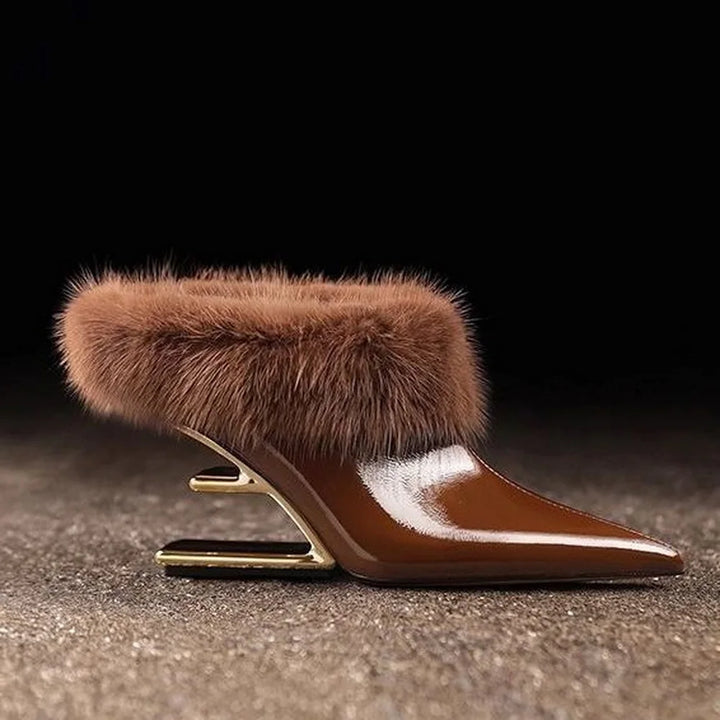Brown patent mule with faux fur collar, side profile