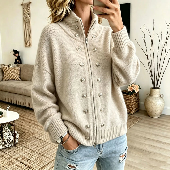 Woman wearing apricot stand collar zip cardigan with button details