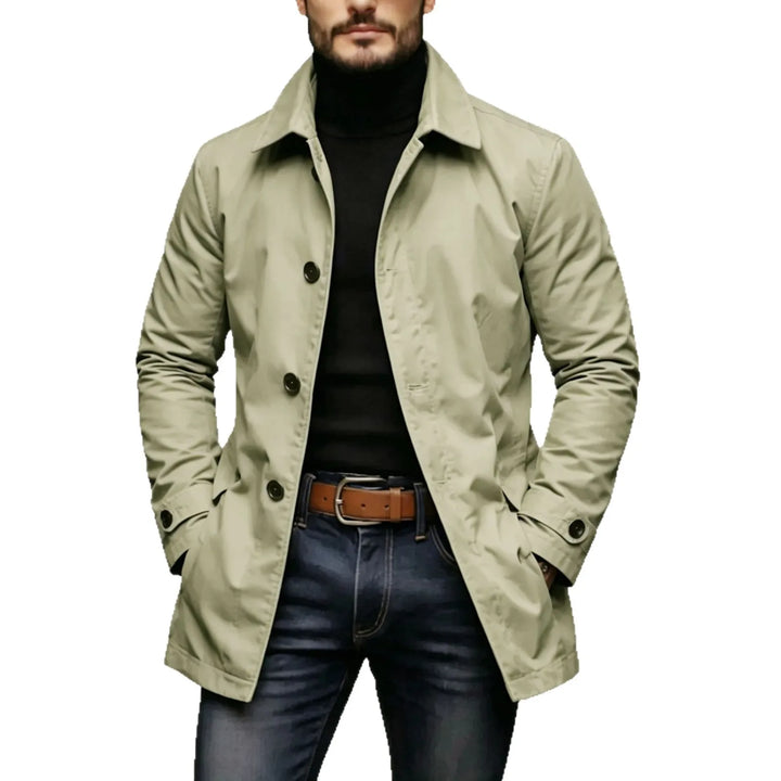 Man wearing khaki mac-style trench coat with button front placket