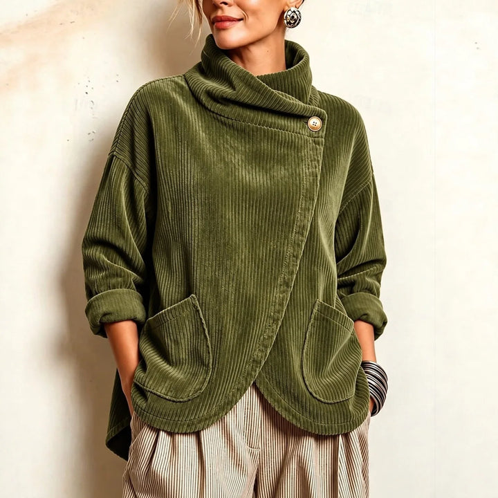 Woman wearing army green corduroy jacket with wrap front and button collar