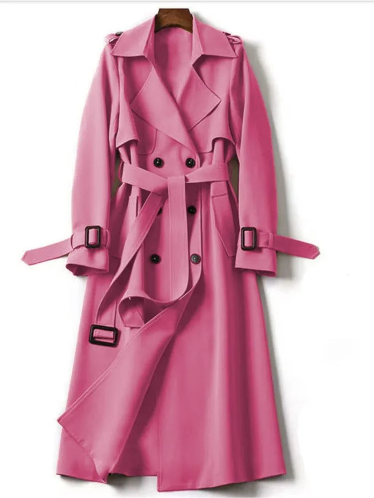Pink belted double breasted trench coat on hanger