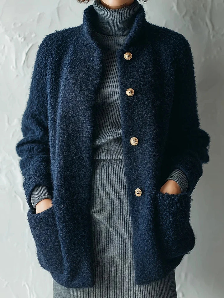 Navy blue bouclé jacket with stand collar, front view