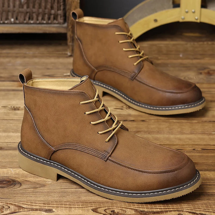 Tan brown chukka boots with contrast laces, side view