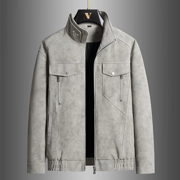 Khaki jacket with stand collar and chest pockets, front view on hanger