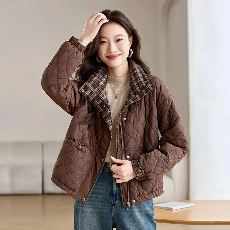 Woman wearing coffee brown quilted puffer jacket with plaid collar