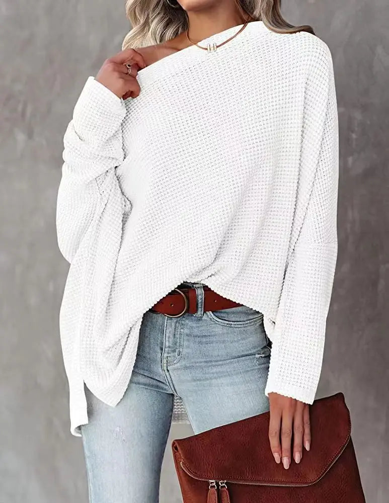 White waffle knit off-shoulder sweater close up