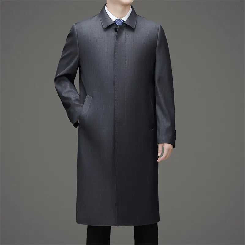 Man wearing gray single-breasted long trench coat with turn-down collar, front view