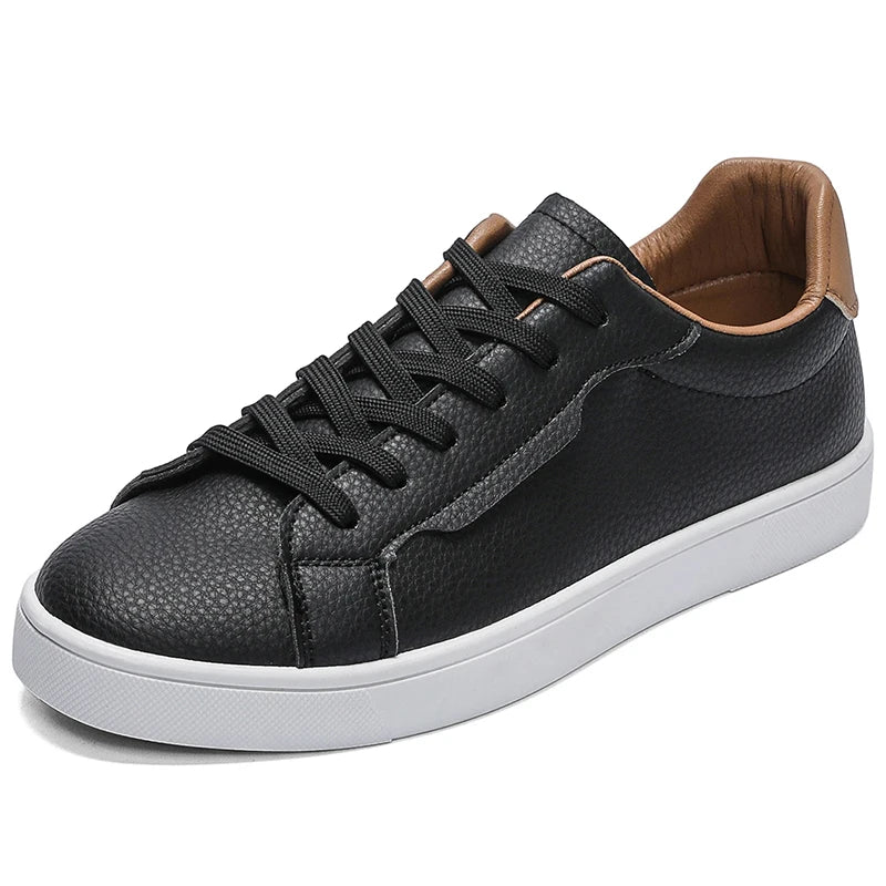 Black sneaker angled front view showing toe and lace detail
