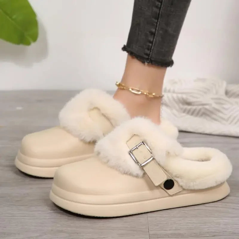 White faux fur platform clog slipper worn on foot, front angle