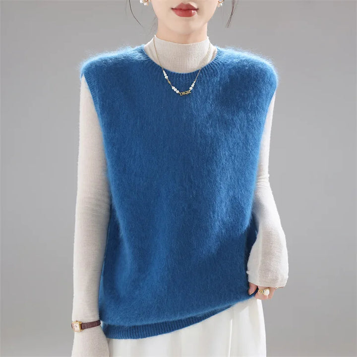 Model wearing blue brushed knit sweater vest close up