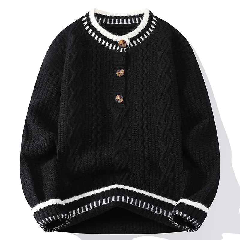Black cable knit pullover sweater with white contrast trim and button placket, front view