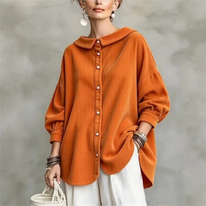 Orange blouse with turn down collar and balloon sleeves, front view