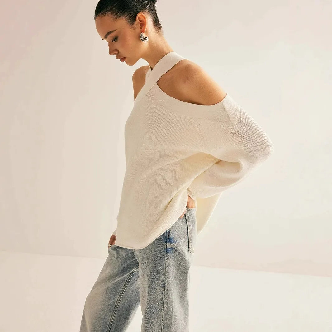 Side view of white halter neck cold shoulder sweater