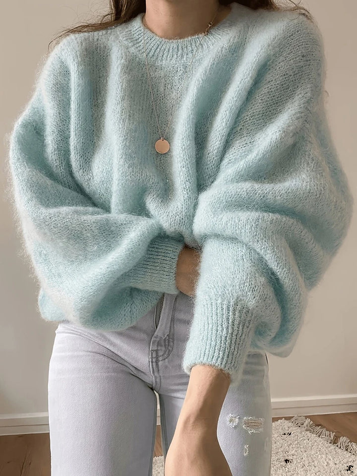 Light blue fuzzy oversized pullover sweater, front view