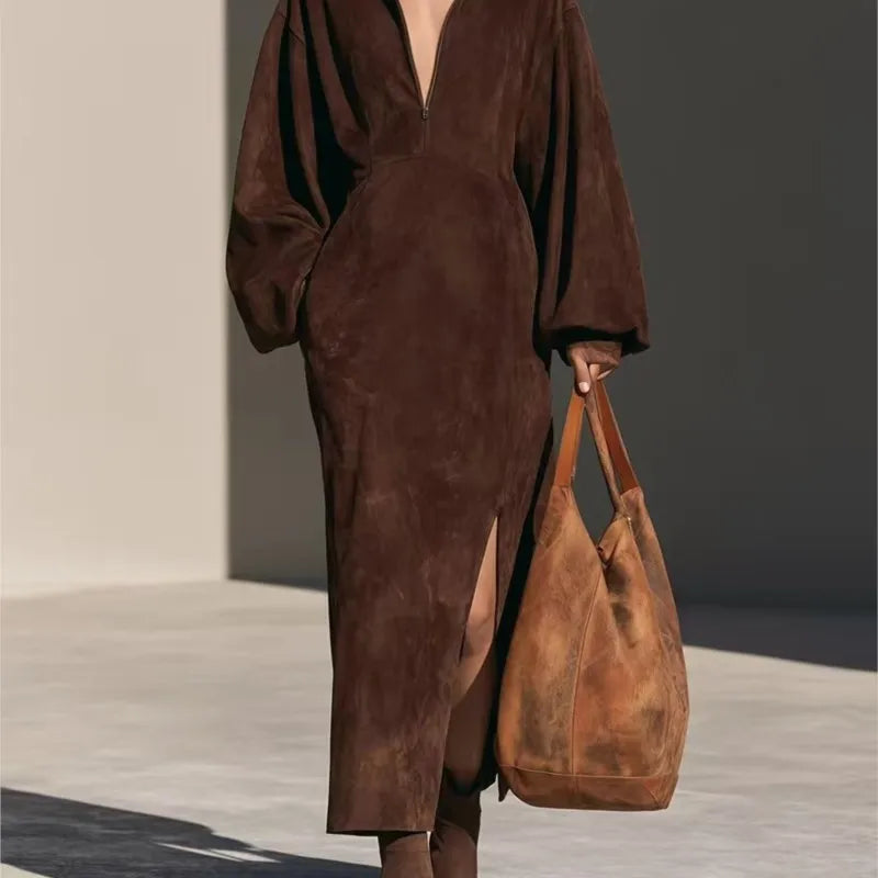 Brown suede-look sheath dress, close-up front view with side slit