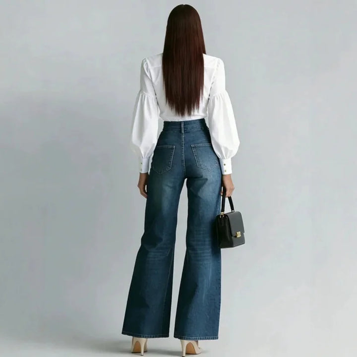 Back view of wide leg denim jeans showing patch pockets