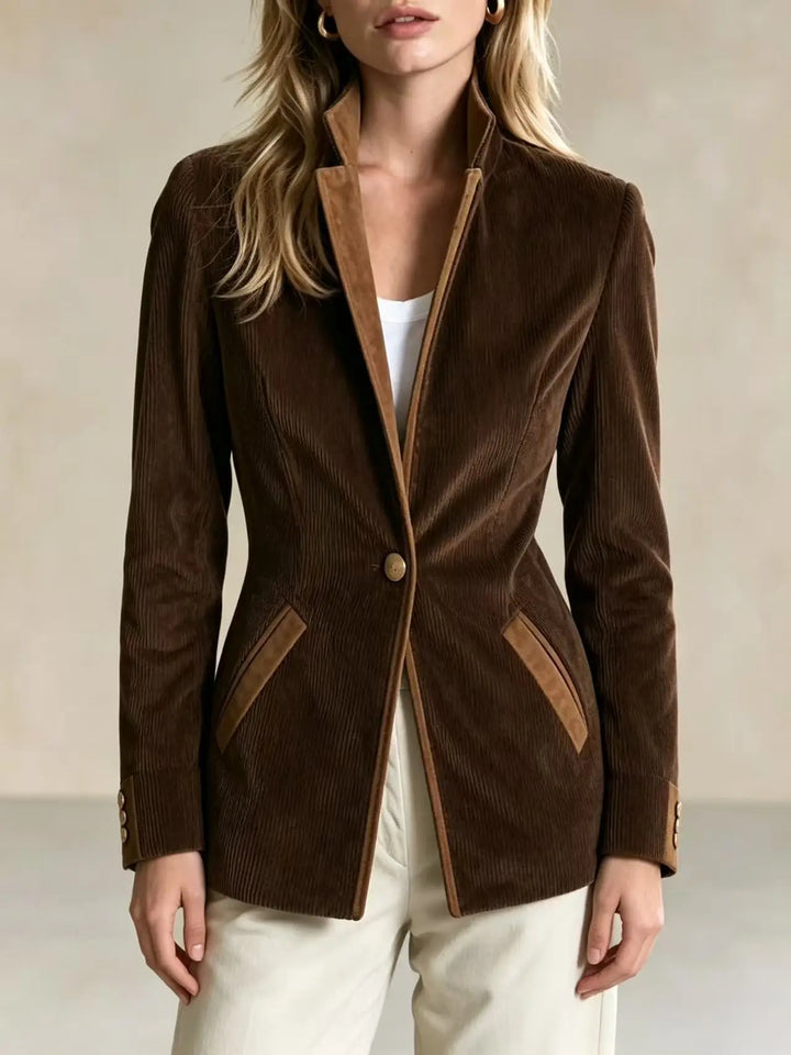 Close-up of brown corduroy blazer with single button closure