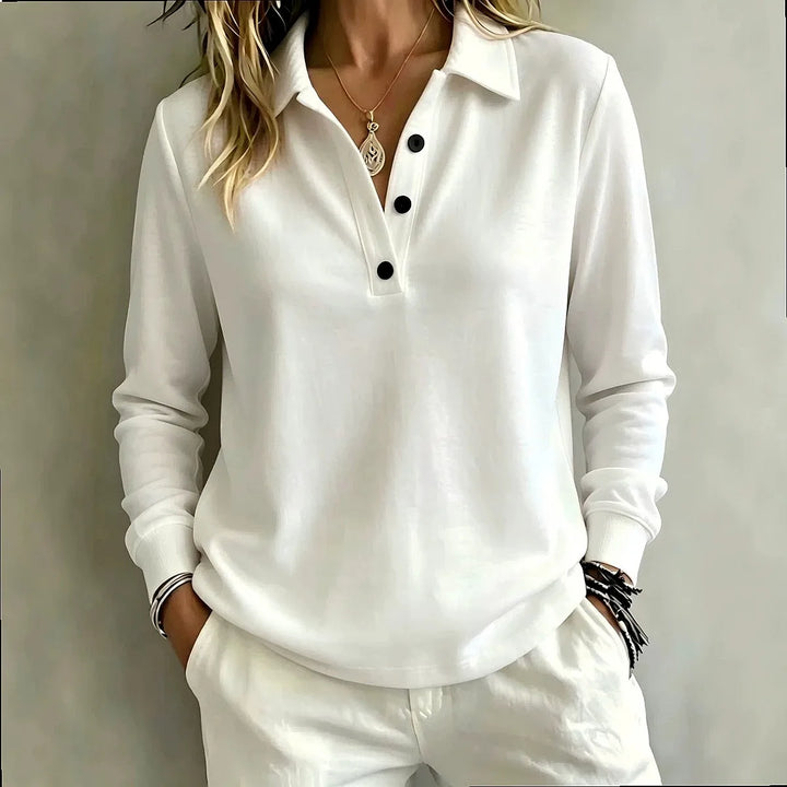 White long sleeve polo shirt with button placket, close-up
