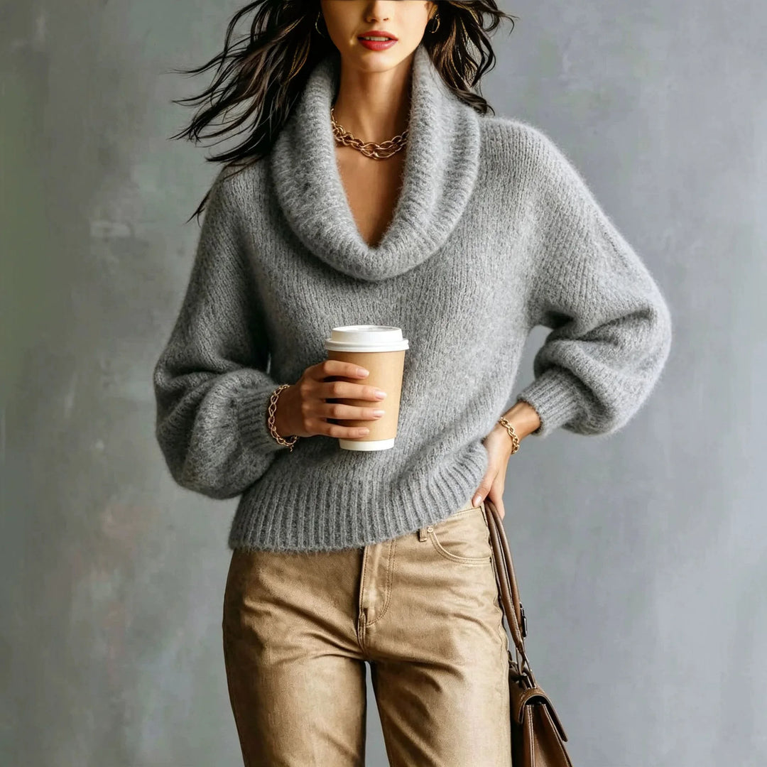 Woman wearing gray cowl neck chunky knit sweater