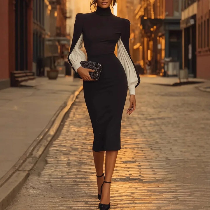 Full length front view of black turtleneck pencil dress with white bishop sleeves