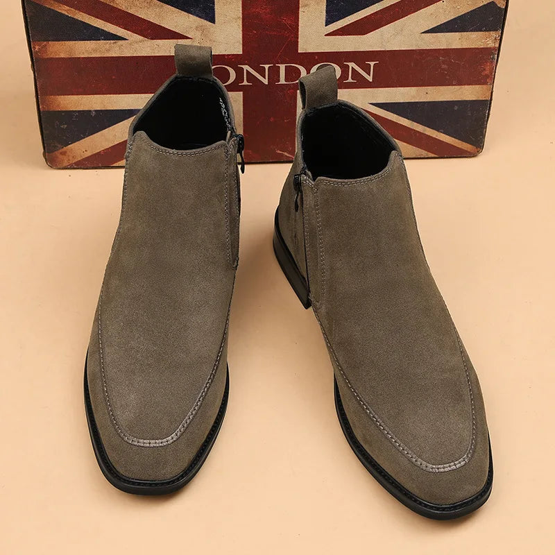 Pair of brown suede Chelsea boots front view