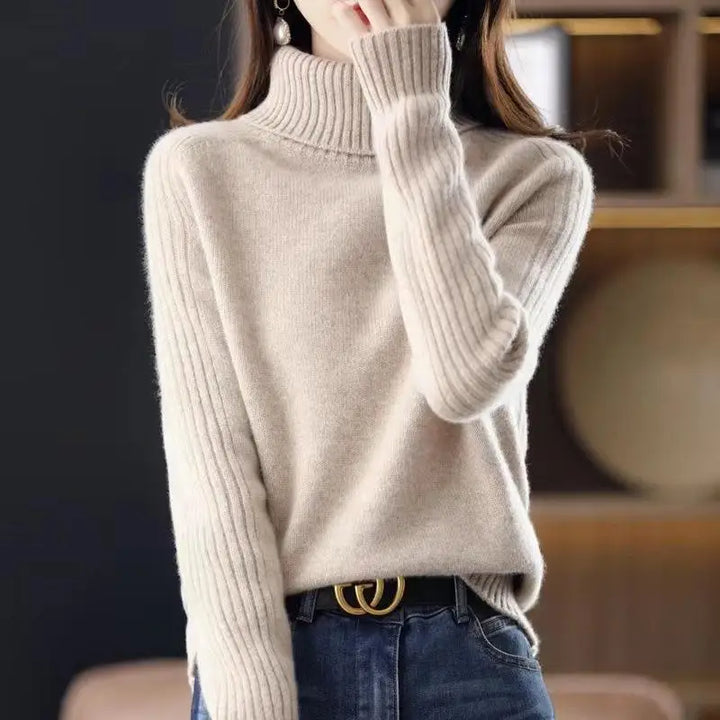 Beige ribbed turtleneck sweater with belt detail