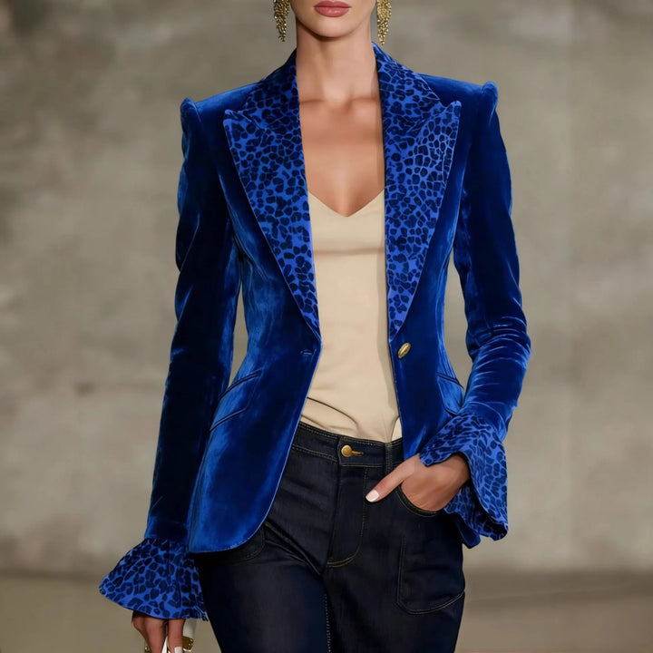 Dark blue velvet blazer with leopard print lapel and flared cuffs, front view