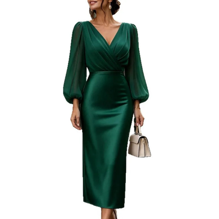 Woman wearing green wrap front satin midi dress with lantern sleeves