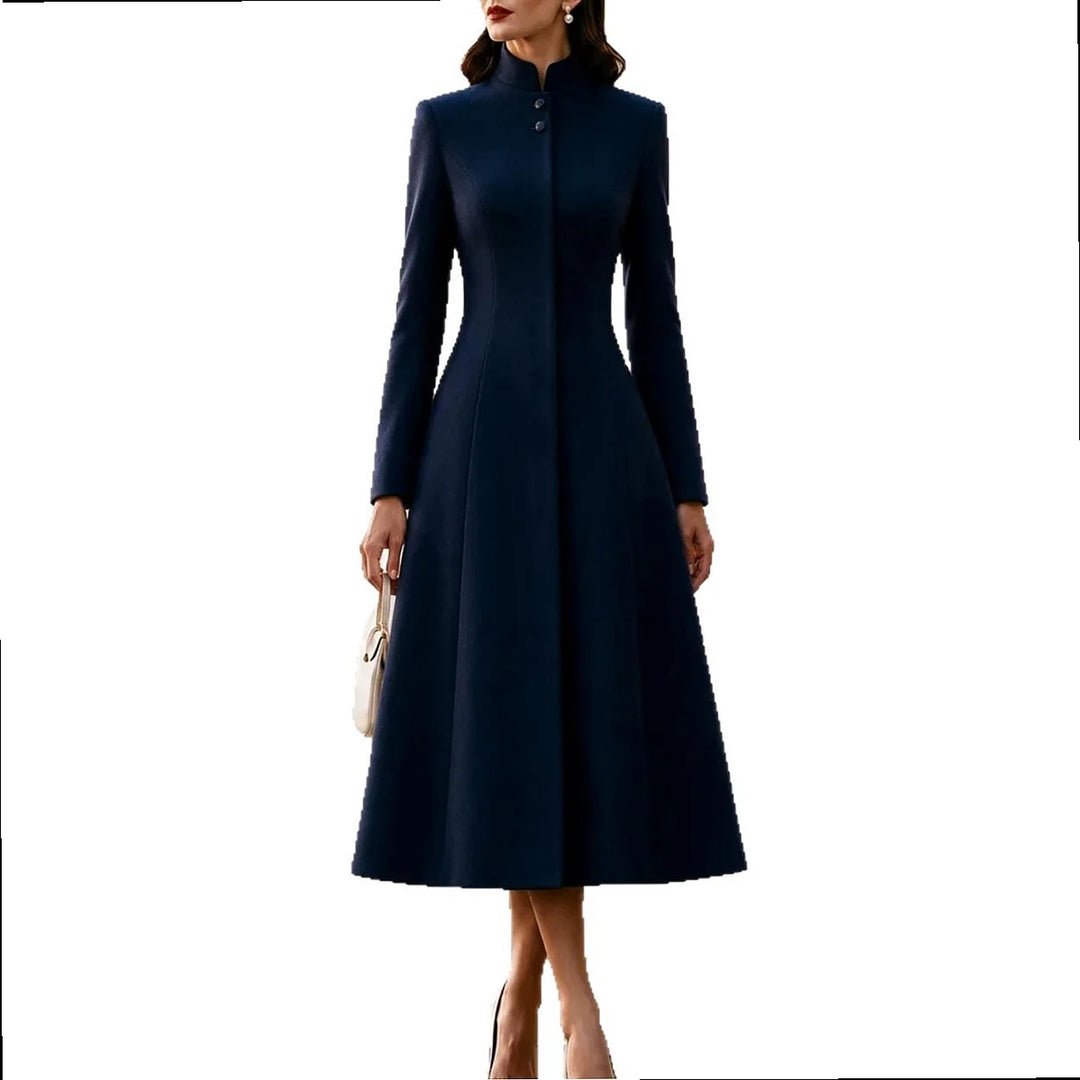 Woman wearing navy blue stand collar coat dress against plain background