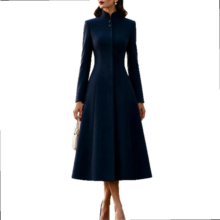 Woman wearing navy blue stand collar coat dress against plain background