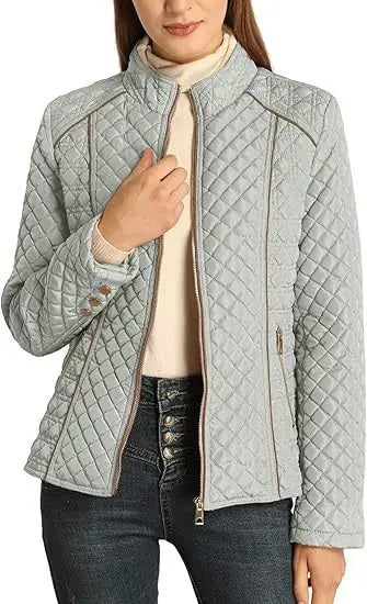 Woman wearing gray-blue quilted puffer jacket