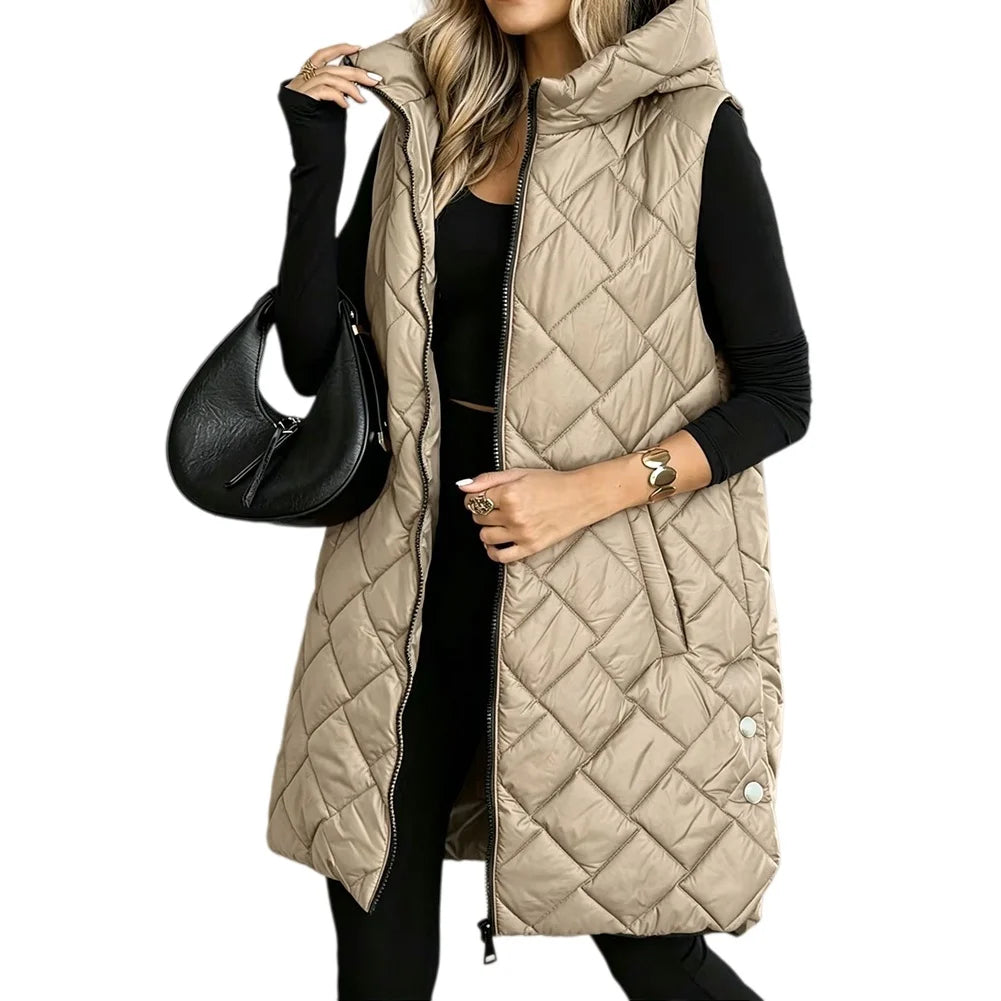 Woman wearing khaki long quilted puffer vest with side snap detail