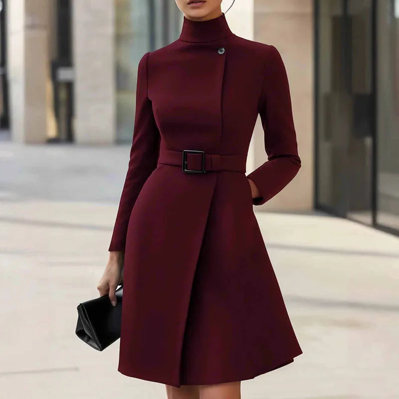 Model wearing wine red turtleneck A-line dress with belt, full view