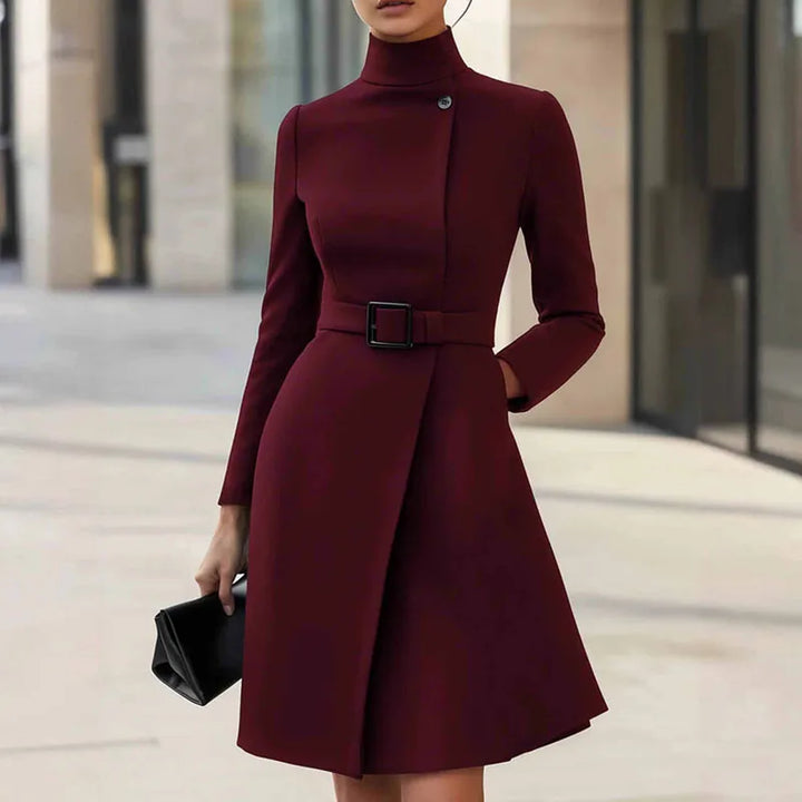 Model wearing wine red turtleneck A-line dress with belt, full view