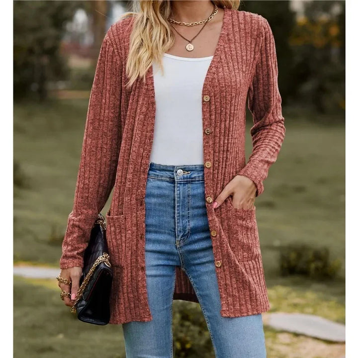 Woman wearing burgundy ribbed knit open front cardigan with pockets