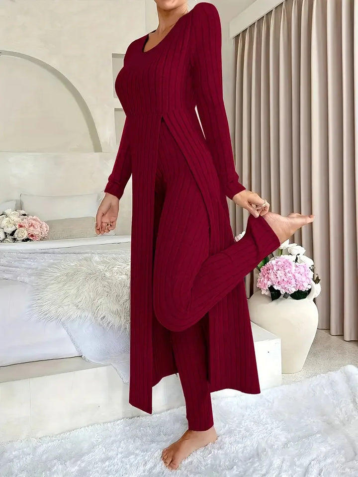 Woman wearing red ribbed long slit two piece loungewear set