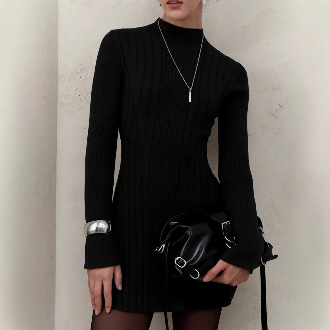 Black ribbed knit sweater dress with mock neck close up